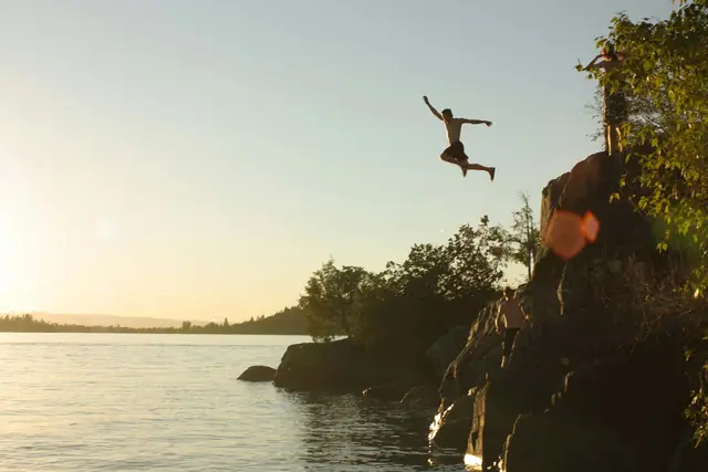 Cliff jumping at sunset